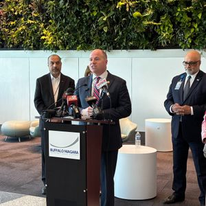 Congressman Tim Kennedy (D, NY-26) announces federal funding for the Buffalo Niagara International Airport to secure four new shuttle buses