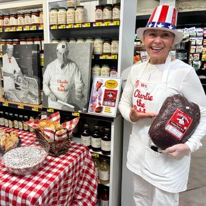 Co-owner of Charlie the Butcher, Bonnie Roesch, aka 'Mrs. Charlie the Butcher' celebrating National Roast Beef Day at Dash's Market in Williamsville