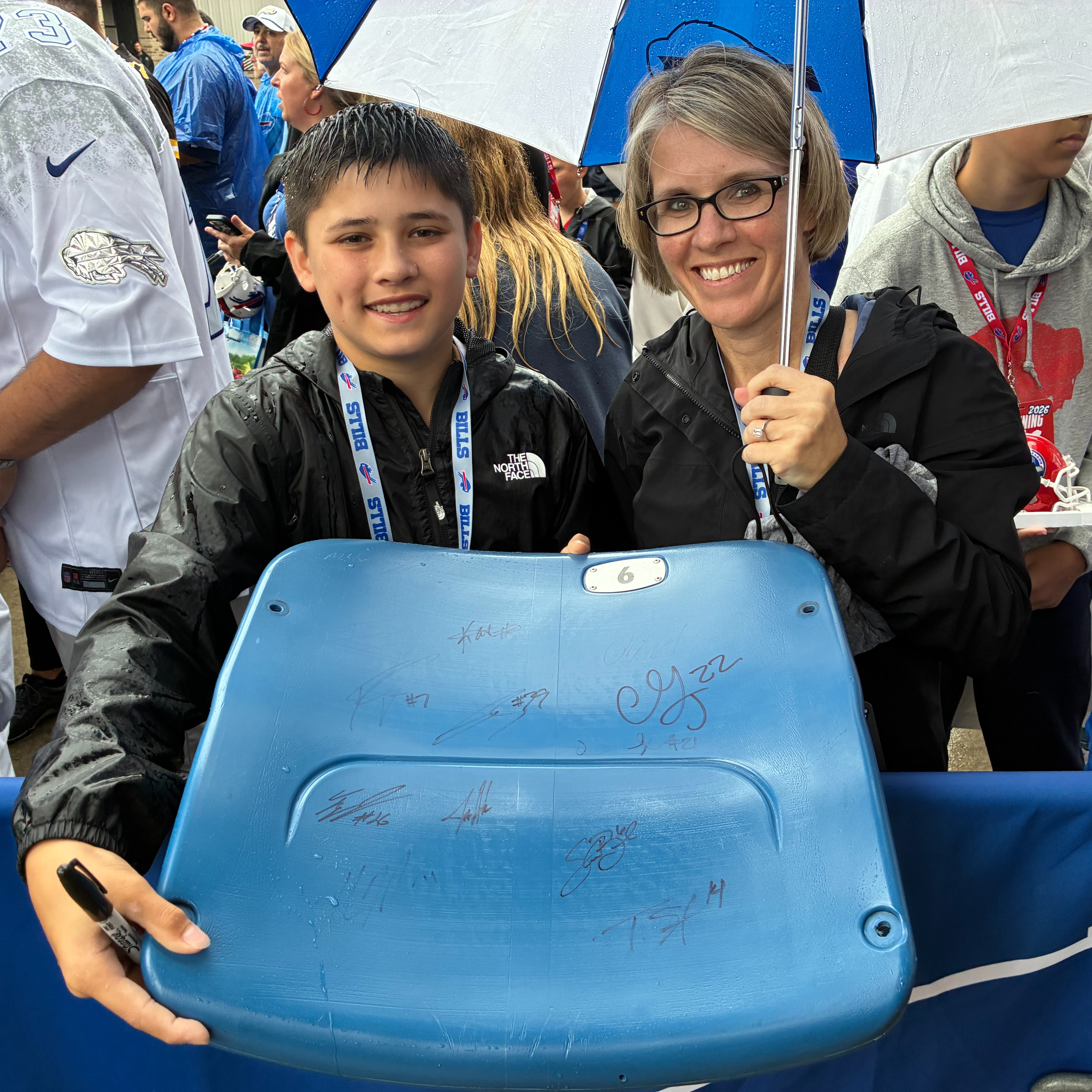 Bills fan Owen and his mom Kim from Clarence at Bills training camp at St. John Fisher University