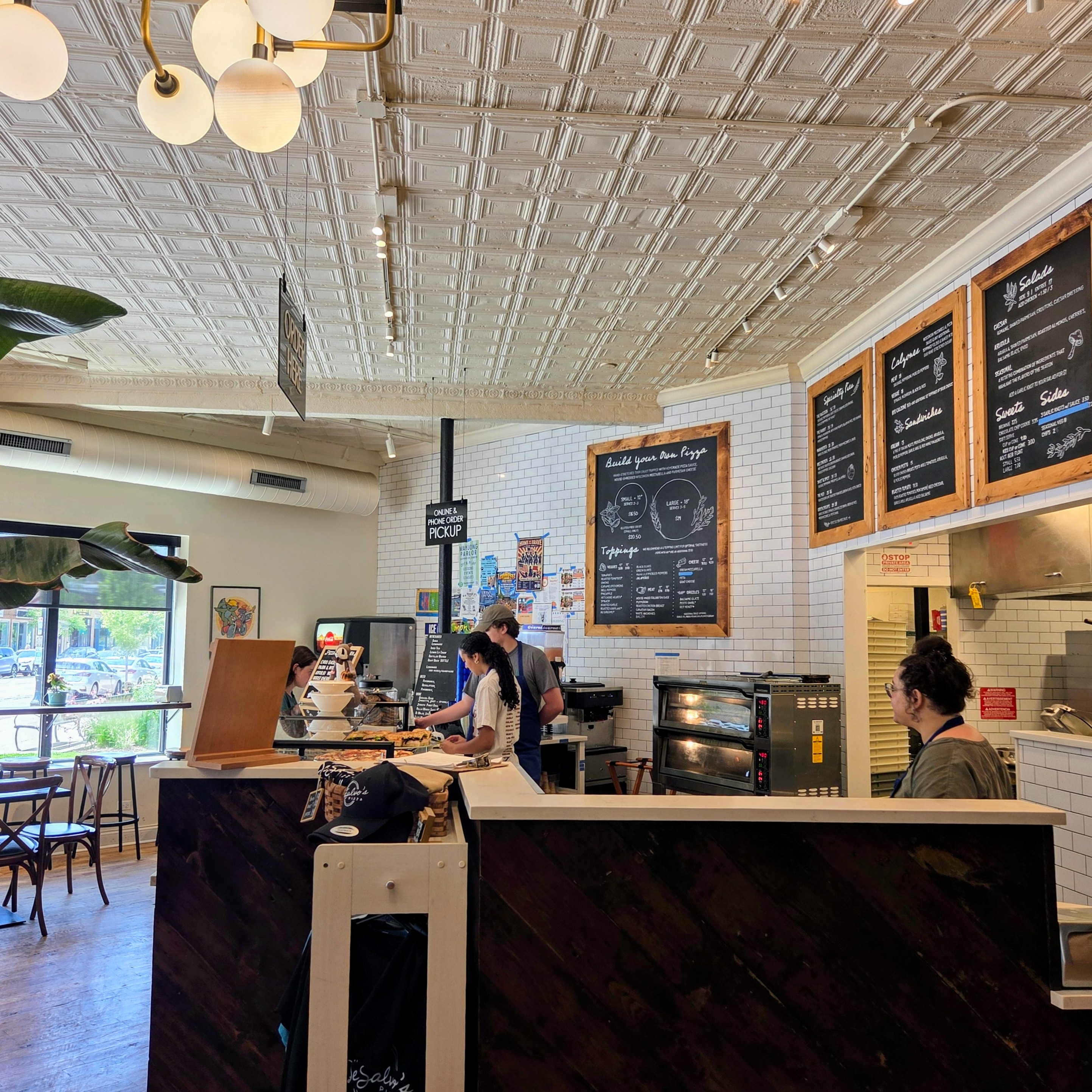 Hot times means fast work at pizzeria