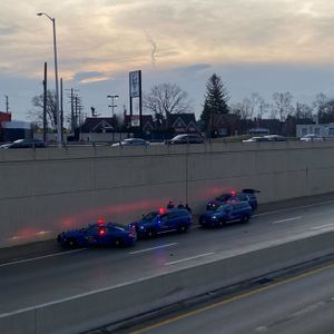 Ambulance crew finds body on side of Detroit freeway