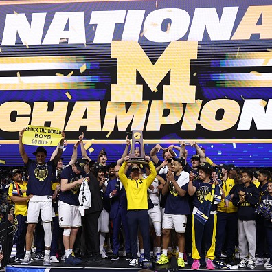 Michigan fans celebrate, set fires after team wins NCAA Championship