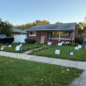 Lawn signs outside St Clair Shores home draw criticism from some residents