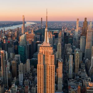 Why did a couple climb to the top of the Empire State Building antenna?