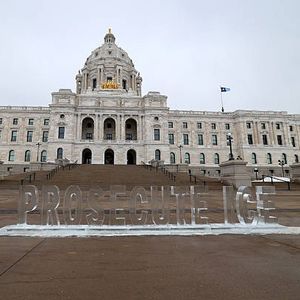Far-right activist Jake Lang charged with bias crime after knocking down "Prosecute ICE" sculpture