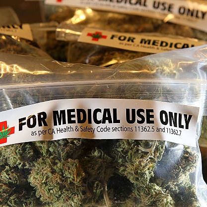 Trump reclassifies state-licensed medical marijuana as a less-dangerous drug in a historic shift