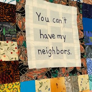 Minnesota Immigrant Rights Action Committee unveil massive 11,000 patch quilt made in protest against ICE