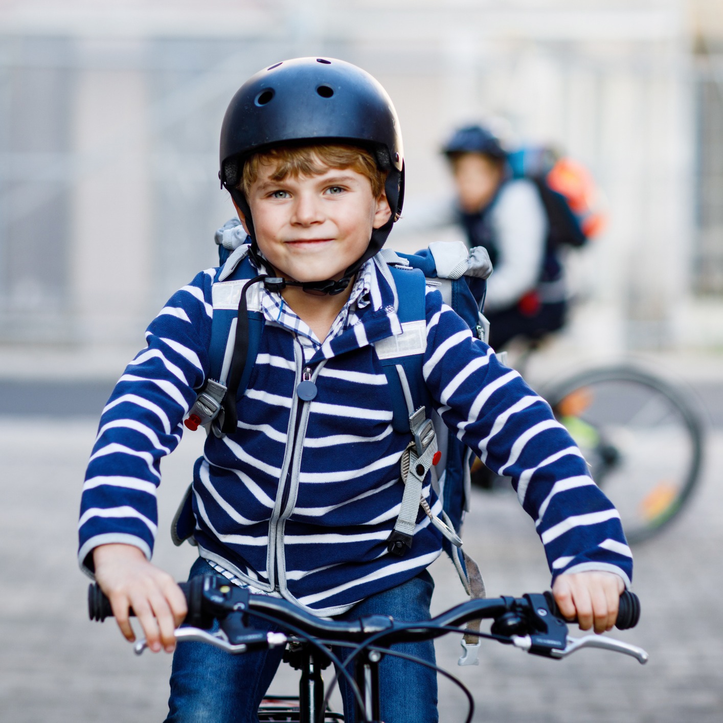 Keeping kids safe on the roads with their bikes and scooters, our own, The American Academy Of Neurology!