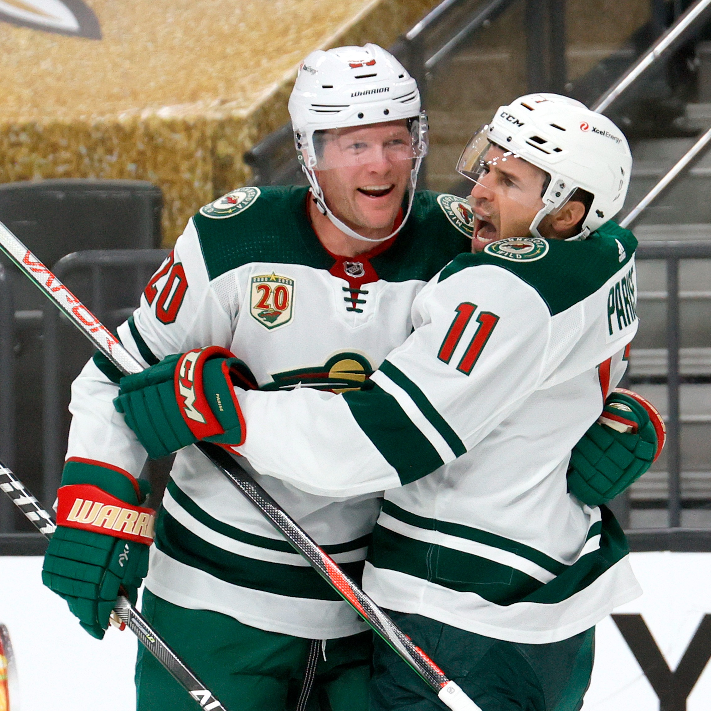 Where was Heather Rule when she heard that Parise and Suter signed?