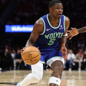 Wolves extinguish Heat in dominant season opener