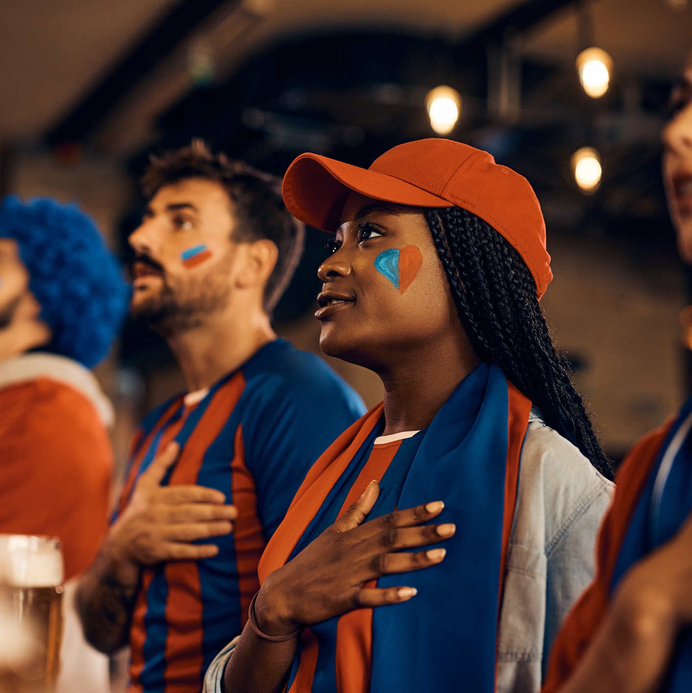 Should women take their hats off for the National Anthem?