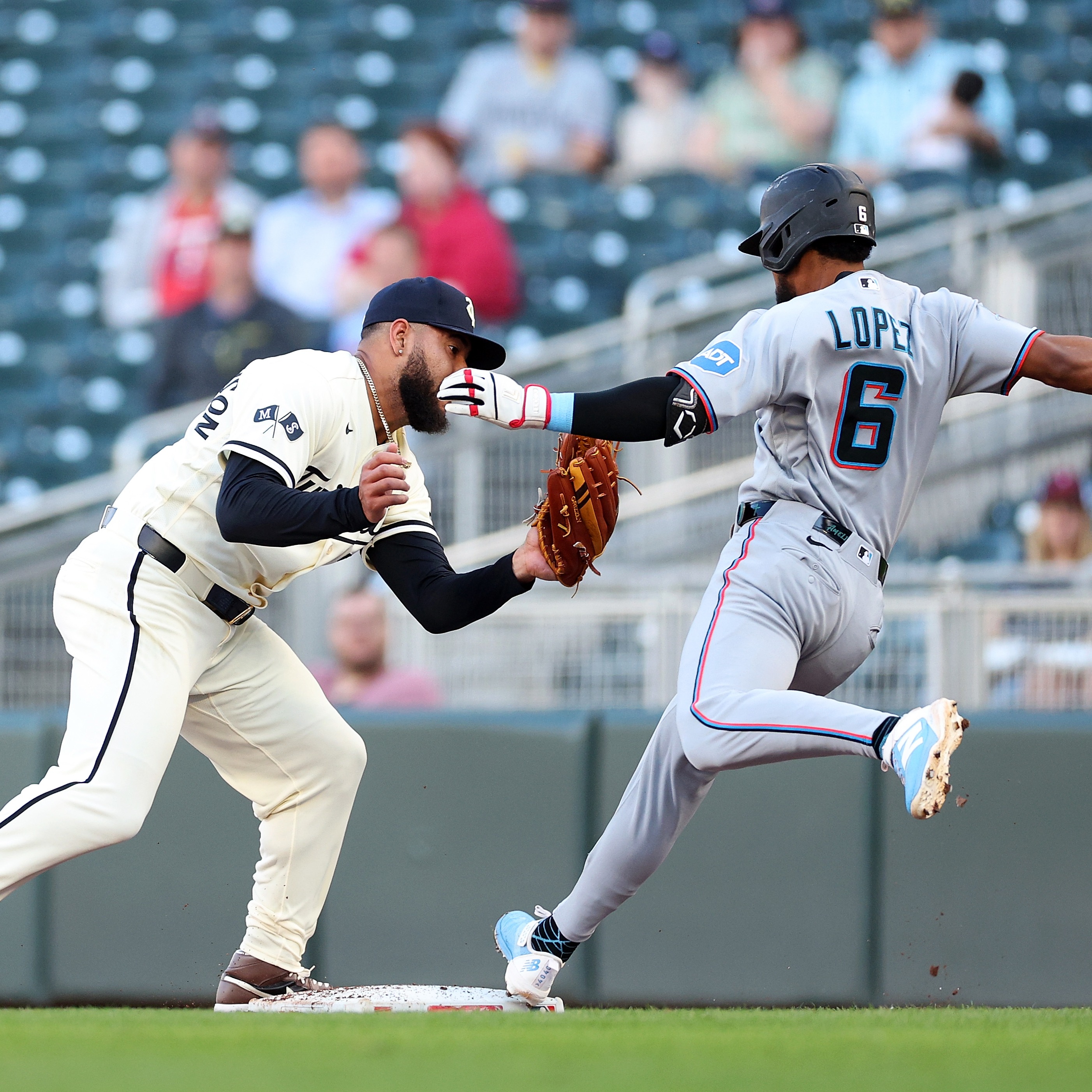 Sim struggles early as Marlins pound Twins