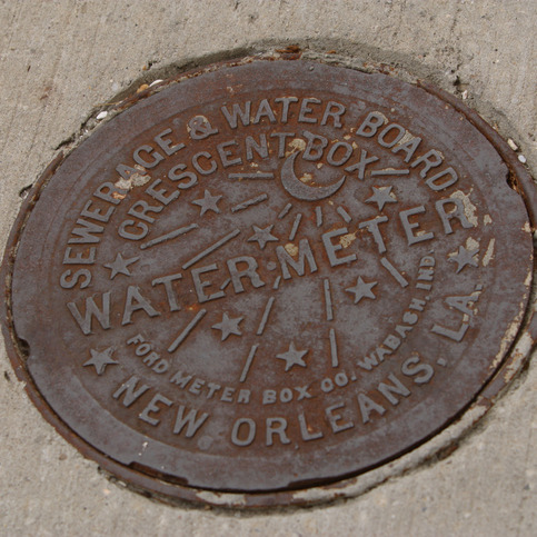 Some New Orleanians are taking it into their own hands to clean catch basins