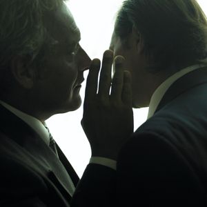 When does a representative protecting a business deal become keeping secrets from the people they represent?