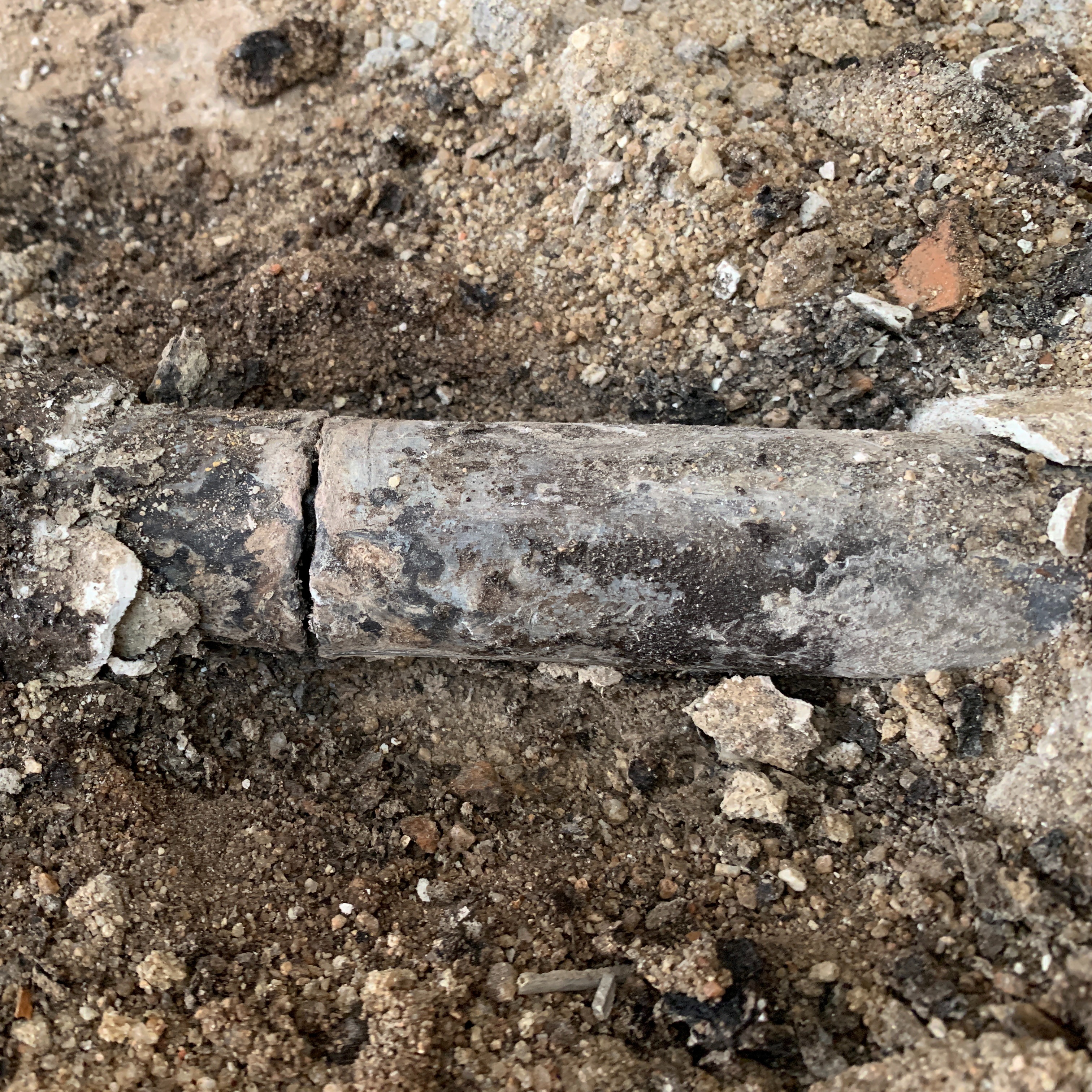 Who should pay to replace old lead water lines that run onto private property?