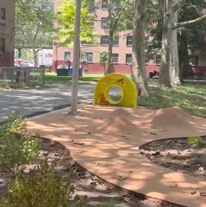 Brooklyn NYCHA complex unveils playground surface made from recycled wine corks