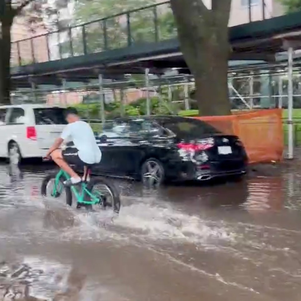 Massive flood on Neptune Avenue frustrates drivers, fun for kids