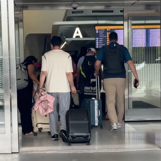 New Yorkers at JFK airport departing for the long weekend