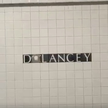 Local artist replaces missing subway tiles with artwork