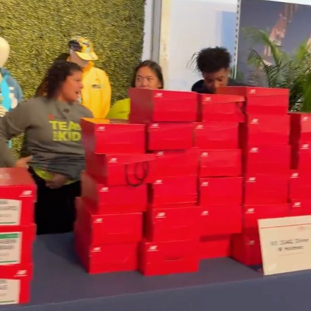New York Road Runners gifts free running shoes to kids across NYC