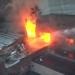 Firefighters battle two-alarm blaze at Kensington garage