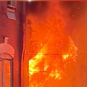 Woman found dead inside burning North Philly home