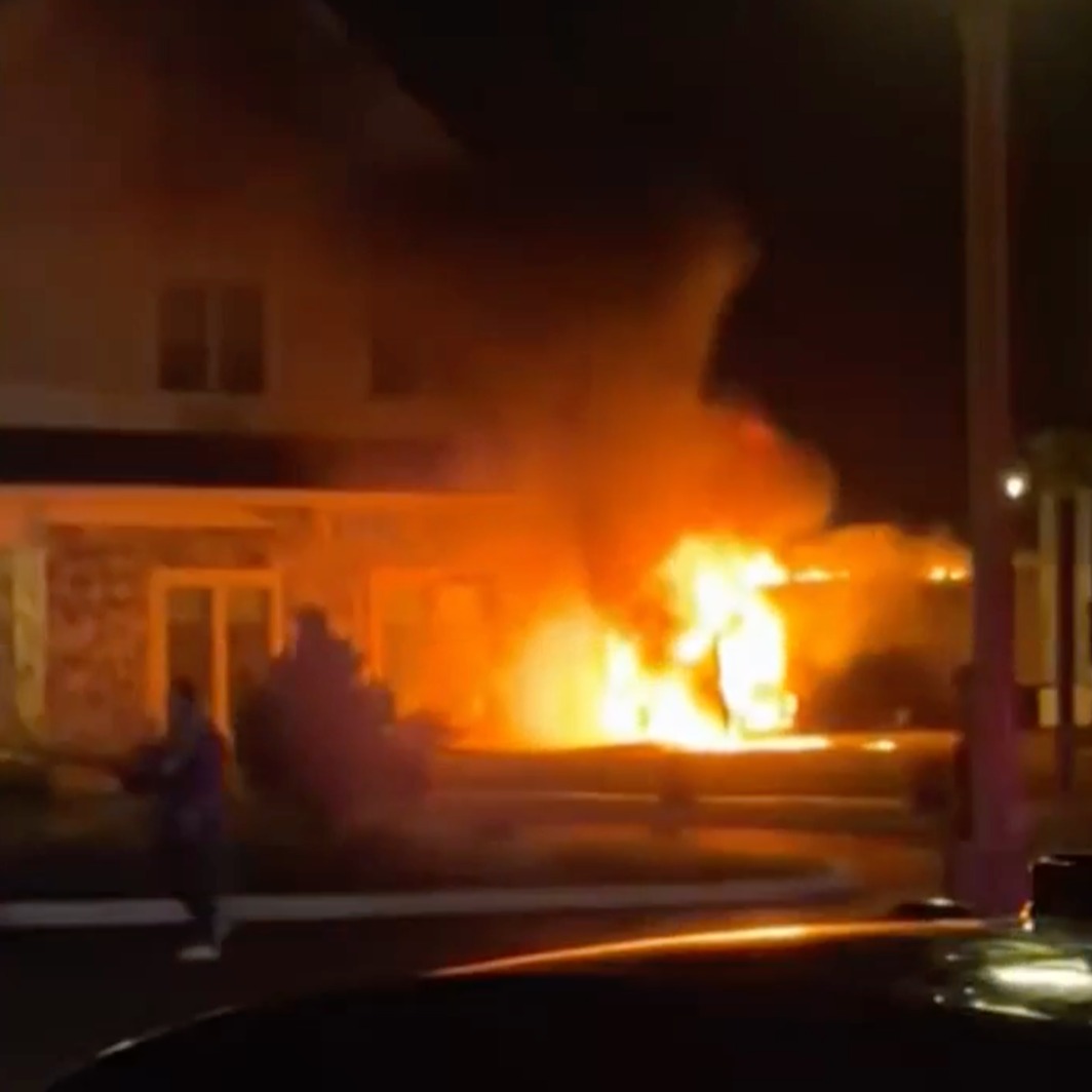 Van bursts into flames after crashing into NJ nursing home