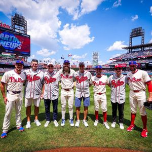 Former players who never had a big league moment throw ‘Field of Dreams’-inspired first pitch