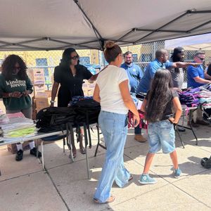 SEPTA workers make a stop in North Philly to supply backpacks and school supplies to families in need