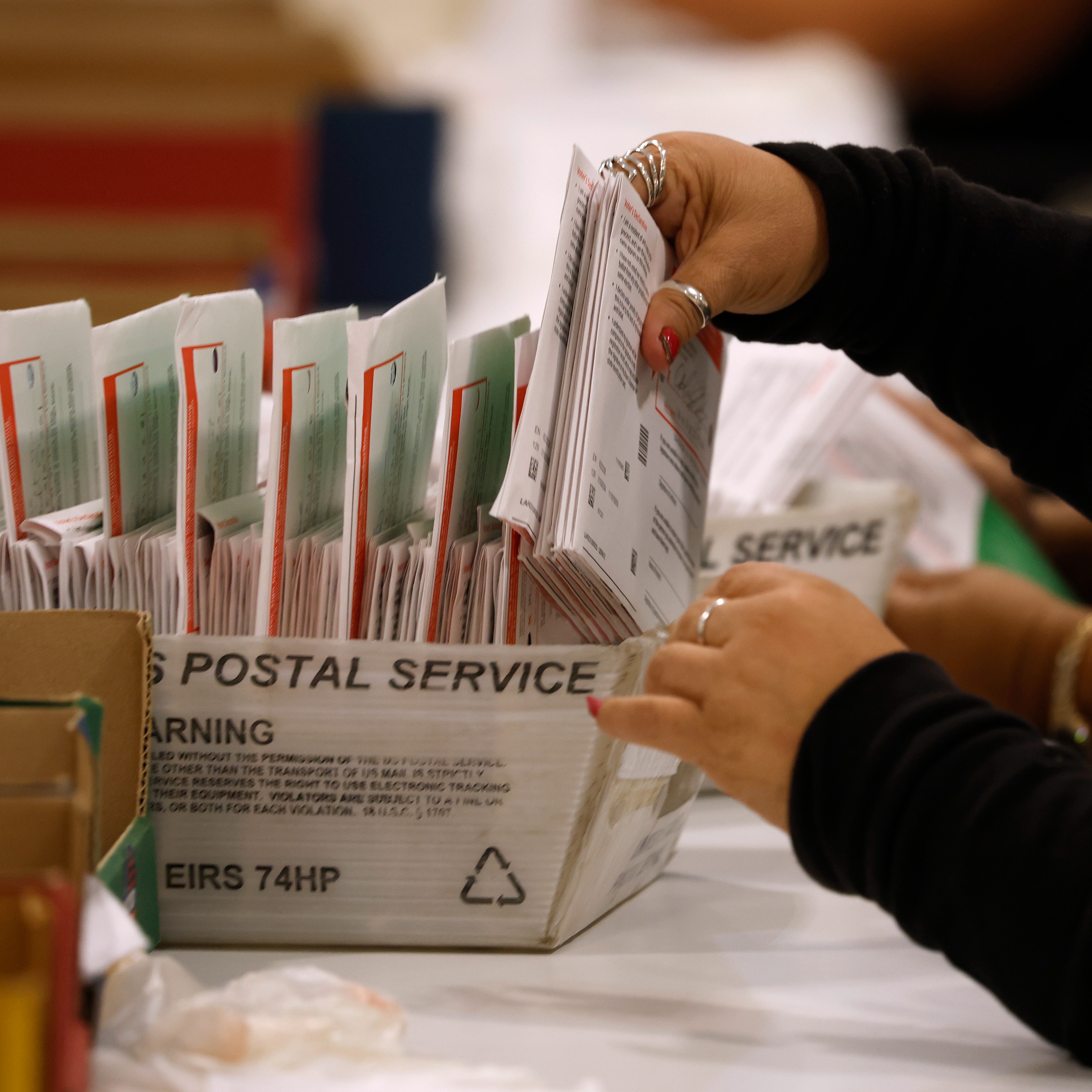Federal judge freezes Trump mail ballot order
