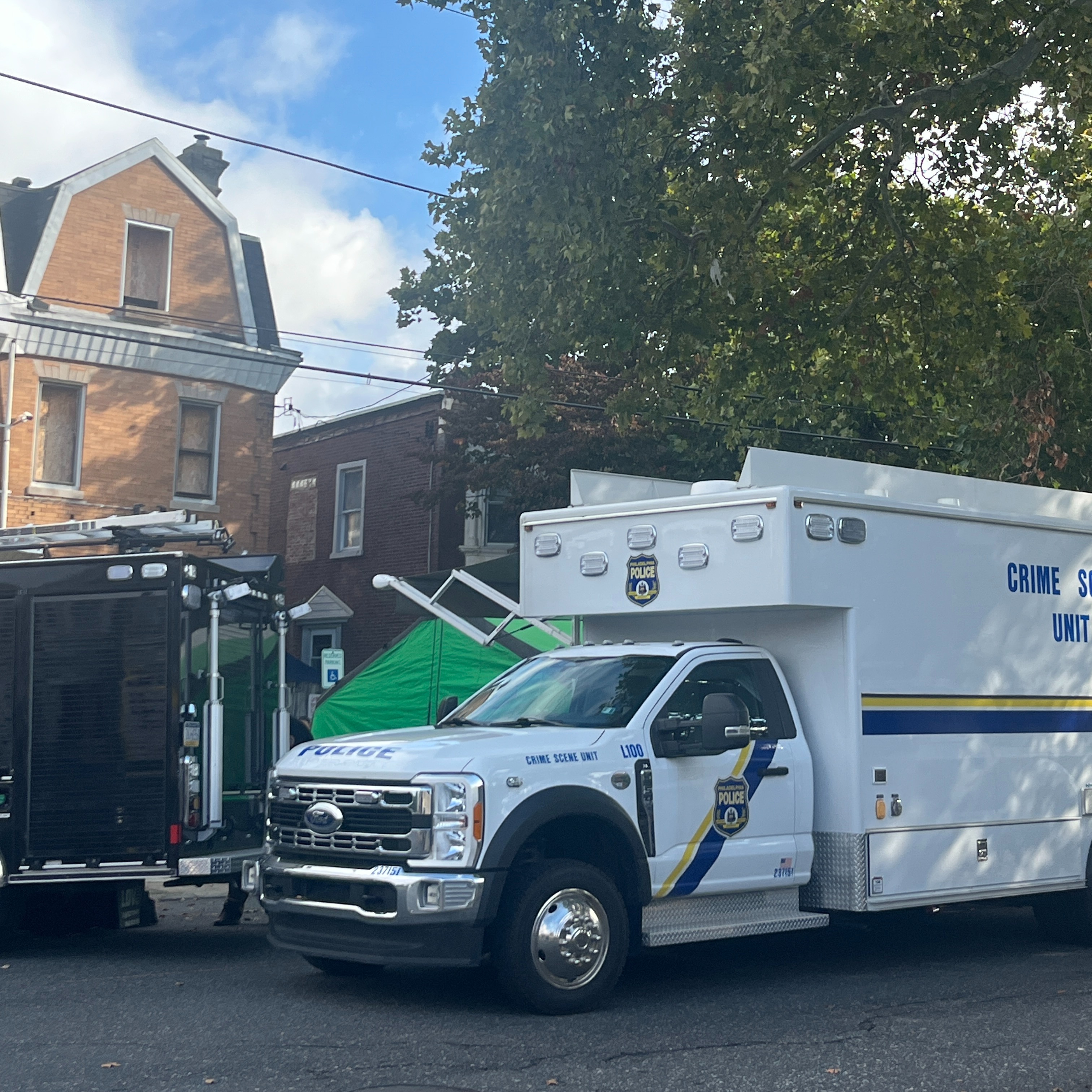 Medical examiner seen at Olney house as investigation continues