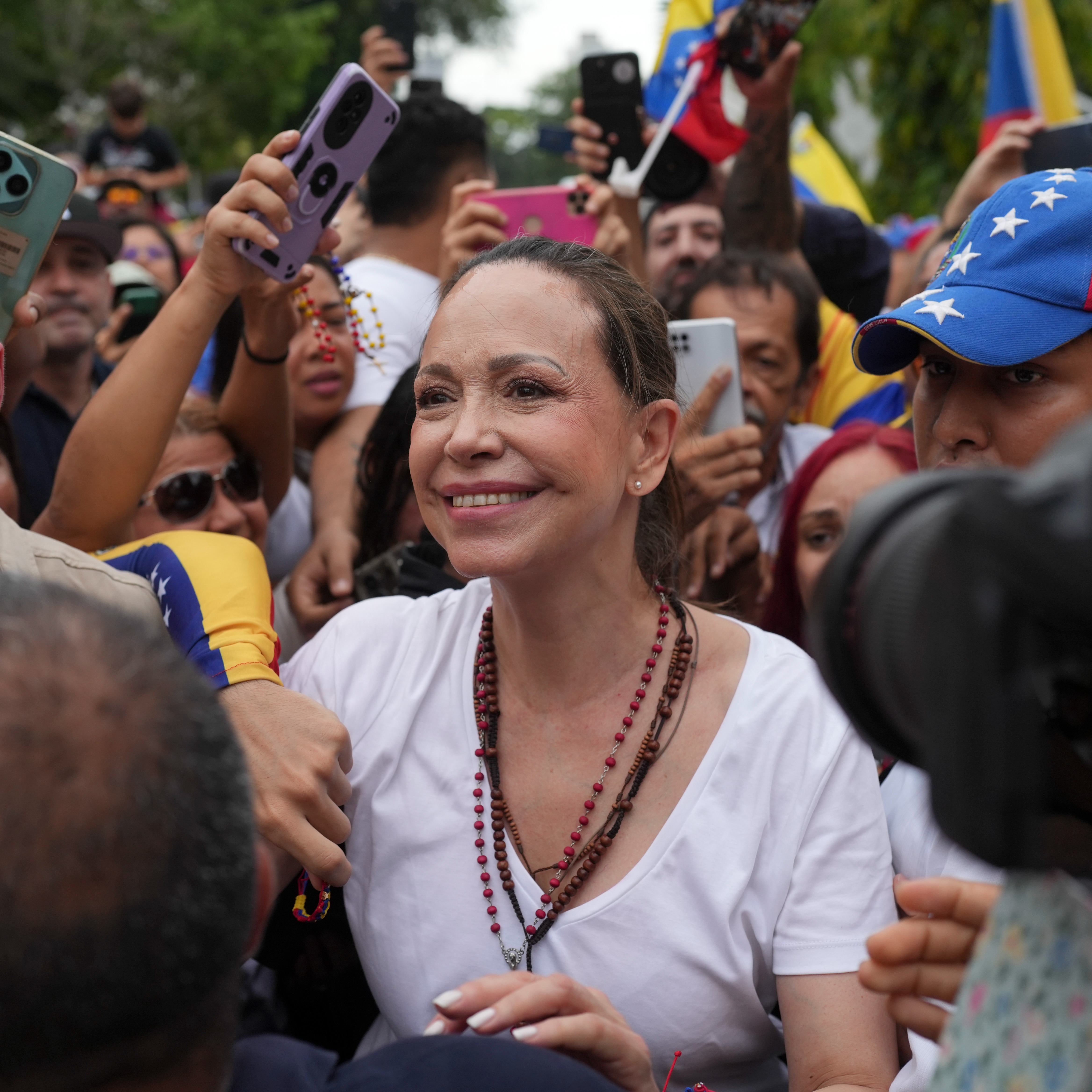 After nearly a year in exile, Venezuelan opposition leader returns home
